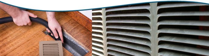 Someone cleaning an air duct.